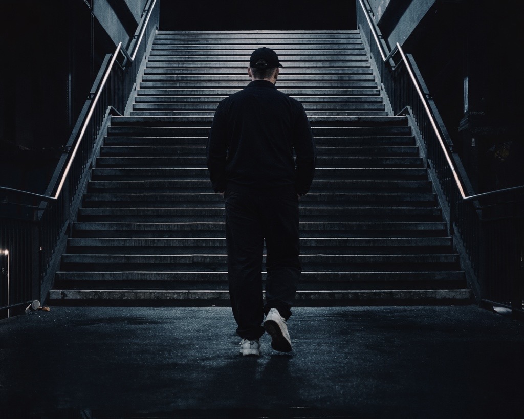 CENKK on dark stairway